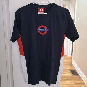 Mind the Gap t-shirt. US Men’s Medium; UK Large. Navy blue.